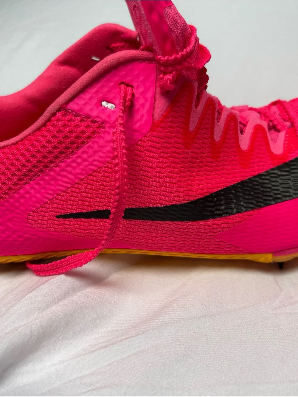 Nike Bright Pink Athletic track with Black Swoosh men’s 10/1/2